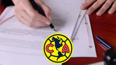 Firma de contrato con escudo del América
